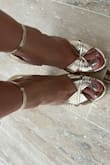 I bought these for a wedding and even though I decided to wear something else, I kept them because they are amazing. Comfortable, the gold shade is perfect and they look expensive. I ordered half a size smaller than my usual size and they fit perfectly. Not for wide feet though! Get them! - Daniela D.