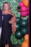 If you are between sizes, size down. I think the dress looks best and keeps its shape when it is a little snug. Wore this to a Havana Nights themed work party, and it was perfect. I'm not usually comfortable in form fitting dresses, but this one fit perfectly in all the right places, and I didn't have to wear a bra! Great price and super comfortable. - Kate J.