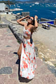 I wore this in Italy on a hot day and it was perfect! The slit is really high so I would recommend shorts or a bathing suit underneath. The fabric is super breathable, no bra is needed, and it's tall girl approved! - Angela B.