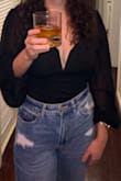 This shirt is so cute but it's really short. I am pretty short and I could barely button the bottom. Other than that, the sleeves are so cute and it's great quality - Allyson C.