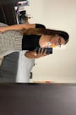 This shirt fits great it's really good material, and it's like not too short so that it rides up, I would definitely recommend getting it! It pairs so well with jeans, a skirt whatever! - Alexis A.