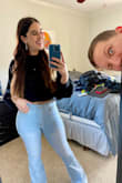 This gives all the flair of being a crop top with the warmth of being a sweater! I would definitely size down in it, so I ordered a size smaller than I normally would, and it works great because of how big the sleeves are! I definitely think it is great but beware it is a crop top, so it's not going to fit like a regular shirt! But that's what I wanted - Alexis A.