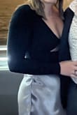 I love this too! I wore it for new years and got several compliments. I noted it ran a little small mainly because I have pretty broad shoulders. The only time that was an issue was taking it off and putting it on, but once it was on, it fit perfect! - Sara G.