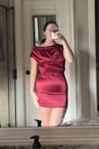 I was so excited about this dress but was disappointed when I tried it on and it fit super small. The bottom was extremely tight and barely fit around my hips and butt as you can see in the photo. If you don't have larger thighs or wide hips this dress would probably work for you. However, I have a more athletic hourglass build. My stomach is also pretty flat, and it was still unflattering in that area. The dress was definitely great quality and cute; sadly, it just didn't fit. - Grace B.