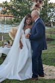This dress was my dream come true. I did ordered a size 8 first and it was a little small on me , I sized up to a size 10 and was just perfect. I looked at hundreds of dresses and as soon I came across this dress my search was done . Loved it , it looked just like a bridal boutique dress. - Yudeisy C.
