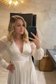 I was hesitant on the sizing since I fluctuate between medium and large, but based on other reviews I went with the large. The dress fit beautifully and I got so many compliments! If you're looking for a sign, this is it! Order the dress - Kaitlyn G.