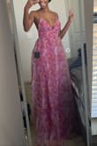 I often wear more form-fitting dresses, but I wanted to switch it up with something flowy, but still flattering. This dress is PERFECT! It is quite long, so tall girl friendly :))) and I'm so excited to wear it to my friend's wedding in Texas! To me, the dress has more of a fuchsia/purple undertone - Andrea G.