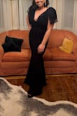 I loved everything about this dress - the material, the fit, the sleeves!! I felt so good wearing it and got a lot of compliments. I just had to sew the tulle covering the chest a bit so it wasnt as loose, but otherwise it felt like a red carpet dress! - Cierra M.