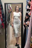 If you want a sexy dress this is it. The low back is beautiful and they make the lining of the back thicker so it stays in place. The one thing I didn't like was that the dress is quite thin. If you have love handles no matter how small, they will show. And you can't wear shapewear because of the low back. - Natalie W.