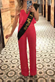 I always get tons of compliments when I wear this. I own it in black and pink. Gorgeous pink. I did have to hem it an inch, which is often the case for me with jumpsuits. - Tatiana M.