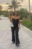 This romper was so flattering and comfortable. I was not expecting such high quality and I got so many compliments!!! It is stretchy so I wish I sized down, but other than that& love ! - Arienne D.