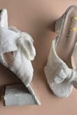 I absolutely love my new shoes. I ordered them for my wedding. They're everything I ever hoped they would be, however, as soon as I opened the box I noticed there was a yellow stain on the side of one of the shoes. I would 10/10 recommend these shoes. But I will be exchanging them in hopes of receiving a pair without any stains for my wedding. - Joy J.