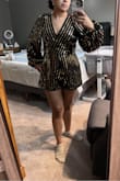 This was an exchange item, my first item was medium size but it was too small. my exchange item is size large and it fits nicely but I notice when I put it on that it had a smell of perfume and also notice some pet hair, then  I notice some damage on the outfit and deodorant marks I do love the outfit, I don't think I can return it since I noticed all the bad details after I removed the tags, this is the first time something like this has happened to me. All the other items I bought from this store are really nice and I will still buy from them. - Lluviany C.