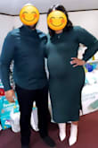 I ordered the Large for my baby shower because I wanted a tighter fit to accentuate my bump. I was 36 weeks when I wore it and it fit perfectly! It was so comfy. The material is thick, great for colder weather. - Courtney T.