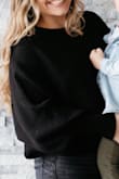 Love this sweater. Really good quality! Thick and warm. Love the bigger sleeves and it's more formed sound the waist. Definitely cropped, but the perfect length for me. I'm only 5'1, though. - Shelbi D.