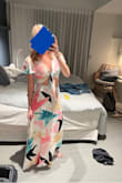 This is not a style I'd normally wear but I wanted something different for a trip. I LOVE it. Fits so well - I have a rounder stomach for my otherwise thin frame and this falls in a way that hides it well. Was able to wear with sandals without hemming but I'm on the taller side. Wrinkles very easily. - Katlyn G.