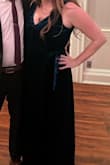 Wore this dress for a formal wedding and loved it. Very comfortable and flattering. I feel the dress could easily be dressed up or down. I did see the top a little to make it more modest and it still looked great. The color looks brighter in person than it did on the photos I took that night - Kristen L.