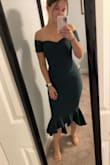 I bought this dress for a Colorado wedding in March. The color is perfect for the mountains. It's classy but sexy. I sent my friends a picture and they were going on and on about how good it looked. It is a little tight and there is no zipper, so if you have a bigger bottom section you'll have to wiggle into it. Once it's on it feels great and looks great! - Sierra E.