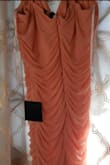 I think the quality is superb and the color really pretty. Just runs a bit small. I give it 9/10. - Shantel R.