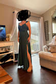 After many dress try-ons I finally ordered this one and immediately knew it was a winner! It is light weight, good quality, fits true to size minus maybe a little tiny bit big in the straps (but not enough to alter). I love it! It's elegant looking with a little sass from the slit. The bride absolutely adored it! The waist wasn't too tight in my rib cage area and the length was perfect with my heels on! I would absolutely recommend! No bra needed for me either! - Hanna J.