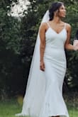 The perfect dress for a small and intimate wedding! My wedding was in Portugal in a vintage house and the dress was truly perfect for the event! It's a simple dress with an elegant touch. - Brunna A.