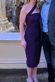 This dress fit me perfectly, I'm so glad I read the reviews about the fit and chose the medium because it was just right. Very sophisticated look while being quite simple. The only reason I didn't give it five stars was that, as others also said, the strap is way too long (had to tuck and pin it but it never really felt secure, so will need to get it altered). Also, the back zipper sticks really badly when it's traveling through the thicker part of the fabric. I was scared to death every time we tried to zip it up or down that it would rip but we managed ok. The dress is so fabulous it's worth the alterations though, so I'll do that for sure! - Caity R.