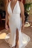 I love this dress! Fits wonderfully other than I would add some cups to better fill out that area. The slit and the stretchy hug of the dress gives it a nice, sexy feel and the train is gorgeous. - Tammy N.