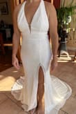 I love this dress! Fits wonderfully other than I would add some cups to better fill out that area. The slit and the stretchy hug of the dress gives it a nice, sexy feel and the train is gorgeous. - Tammy N.