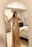 I bought this for my prom dress and it is going to work perfectly with our prom's theme "red carpet"! the dress is so elegant and sparkly I love it. I wasn't sure what I thought of the cowl back but after trying it on I love it! The slit is the perfect height and the dress itself is such a flattering fit - Maddie H.