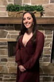 I had to use a safety pin because dress tape was not enough to hold everything together. It fit great and I felt great in it after securing it. - Ana P.