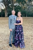 Beautiful dress, so many compliments! Skirt is full enough you cant really tell there is a deep slit in the skirt. Wish it had cups sown in so you  dont have to worry about a bra or anything. Would buy  it again! - Lauren M.
