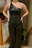 As someone who is taller I was afraid it was going to be short but its not it actually long which I was so happy about. This is going to be what I wear to prom and Ive never been more excited the sparkle on it is unreal. If you are debating this jumpsuit I say just get it and for the price it is great!! - Megan K.