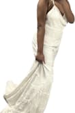 It's a beautiful dress! Definitely not the "one" for me but it's gorgeous and very well-made. Train is long and flowing. Seems best for a beach/destination elopement. Not sure what I'll use it for since it can't be returned- maybe pictures. - Dondreia G.