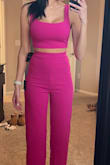 I was nervous the top would be too small, and the pants would be too short. But no, it all fits phenomenally!! I have long legs and usually have to buy "longs" in jeans but these fit great! So if you're on the short side you will need these hemmed. The material of this set is to die for. Super soft and stretchy, so forgiving! I have large augmented boobs, so it's hard to buy matching sets a lot that come together. But the top stretches and fits my boobs well! Now let's talk color. It's listed as hot pink, but in person, it's definitely a true magenta color. I wouldn't say it's hot pink. I still like the color enough to keep it but was bummed it wasn't actually hot pink. - Elana K.