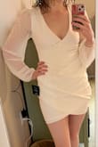 This did tons of favors for my figure! I wound up returning it because it is very low cut and the hem is short too and rides up if moving around a lot. I wanted to wear it for dancing at my wedding reception but it feels too risky. - Madeline W.