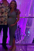 Bought to wear out in Vegas while very pregnant. Fit great and I felt sexy in it. - Norah B.