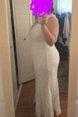This dress is beautiful! Not for my body type though. I'm an hourglass bordering on pear shape, and it's quite unflattering. It highlights my thighs and tummy pooch. The dress is great quality, and it's very soft and comfy. It has slight stretch to it. The shipping and packaging were impressive. Definitely recommend for a slimmer, less hippy body type. - Mary H.