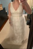 This dress fit my shape much better than any of the other mermaid styles.  The large was a little snug in the chest,  especially across where the belt is, which is a common issue in dresses for me.  I ended up ordering in XL and will have to get probably just straps taken up to make the top fit.  I love the shape of it (thicker straps, not too much cleavage) and that I can wear a regular bra.  I'll probably have to hem the skirts.  The inner lining is definitely tan which isn't as obvious from further away.  It would be perfect to me if it was white.  I may try and have it relined in white.  Keeping it as an option for my wedding in July.  The first photo is of the large and the second is the XL. - Caitlin K.