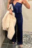 Bought it for a military ball and got so many compliments. Fits very comfortably and makes your legs and bum look amazing plus flattering around the belly with the floaty top part. Dont think twice, just order it! I will order a second one in another color! - Franziska J.