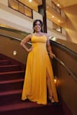 This dress gives Beauty and Beast! I got 100s of compliments on it for a military ball. I had to get it altered a bit. It was very long so I had I hemmed, had the slit sewn to a more respectful level, and had cups sewn in for the boobies. Very little support otherwise. The slit came up to the waist so all your cookies would be on display. I also wore a front sticky bra and double sided boob tape to keep everything in. But it was worth it because I felt so beautiful all night! Now I just have to find another reason to wear it! - Jasmine W.
