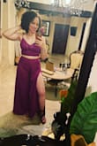 I purchased this randomly and it ended up being the perfect outfit for a night out in Colombia. Fits true to size. The leg slits are super cooling. And I got a ton of compliments. I felt like the pants fit well, though in a few pictures it looked a little diaper like in the front. And the top tied nicely in the back so that I didn't have to wear a bra. - Alexis B.
