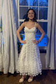 DRESS LOOKED AMAZING. LOVED IT SHE LOVED IT. - Megan N.