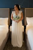 I bought two sizes of this dress because I wasn't sure if a size L would fit me, so I also got a size XL and it fitted just perfect! 
This dress runs a little small so if you're a strong/chubby bride like me, size it up like I did.

The fabric and the lace on the dress is so pretty and delicate. It look very good on my body, I felt like a princess with this dress! - Stephanie G.