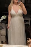 Beautiful dress for our upcoming vow renewal in Santorini. Very pretty lace detailing with tulle overlay. It's a tad too small on my bust/ribs. I need another inch or so to do it up, but it can be altered if I don't lose the weight. I'm 5'10" and it's plenty long enough! My only complaint was that it did not come with a garment bag as it should have. I reached out for support and was told they could not send me a garment bag but instead would credit me with $10 which I was happy with. I asked if it would go on my credit card and I was told yes; however, they actually gave me a Lulus credit that expires shortly. This is useless to me as I have now ordered three elopement dresses through Lulus, and I am unwilling to pay anymore in shipping and import duties as I am in Canada so I will not use the credit. I really wish Lulus had a Canadian website as I do like their product! Overall: satisfied and would recommend - Kerri M.