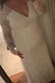 I'm a size large but after reading reviews I sized up and glad I did! I hope it still fits when my wedding comes around because I recently had a baby and the extra weight has been (slowly) falling off.
The dress is amazing quality and even came with a protective bag to hang up. It fits perfectly and doesn't expose too much. I love it! - Jackie E.