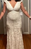 I love this dress and the price point! I think at this time this dress is not for me. I loved the mesh, the  sleeves and overall design . Its a fitted style dress and made my  hip dips more  prominent. - Gizelle P.