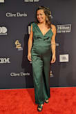 Ordered a large to wear to my friend's wedding and an award show -- got many compliments! I had to get it hemmed and had to adjust the shoulder straps so the jumpsuit didn't ride up so much, but overall a very comfortable outfit. The wider strap could fall a bit, so I might use some fabric tape to hold it in place next time. - Jessica L.