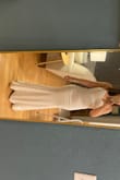 This dress was love at first sight! I was looking for a dress on my budget for my civil wedding and this one was just perfect! The only "con" is the fact that I had to make it shorter, but this is because I'm 5'0. I first ordered XS but wanted to check if the XXS would be shorted -it didn't, but fit even better, then I returned the XS.
The customer service is great! If you're unsure about your size, try two sizes. I have no words about the quality, and I'm being pretty honest here. There's absolutely nothing wrong with this dress. It's just PERFECT! - Taynara G.