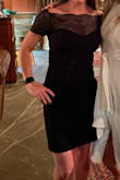 I love this little black dress! I ordered an XS for a snug fit and it fit me like a glove. It's not too short on me (I have very short legs though!) Can't wait to wear it - Melissa A.