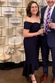 This dress is thick and supportive (read: a little hard to wiggle into) but once it's on, it fits like a glove. It's listed as midi but on a short gal like me, it hits like an evening gown (and no hemming required!). I wore it to a formal wedding and I got compliments all night long, and tons of requests for where to buy it once I posted pictures online. I've been stalking and intend to buy one in every color. I've never found a dress that is so flattering and fantastic with zero alterations. - Madeline B.